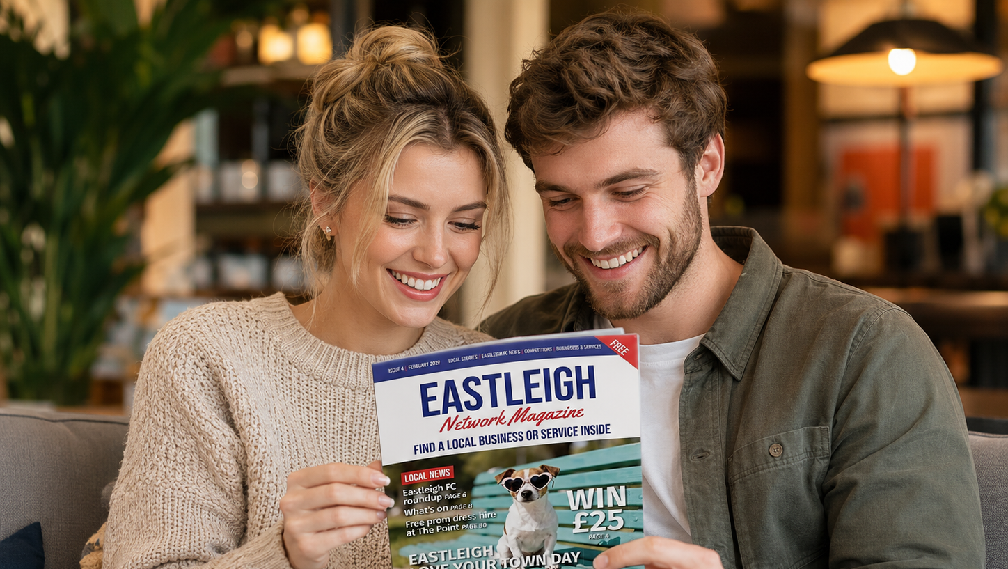 A couple enjoying the Eastleigh Network Magazine at home